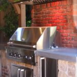 Cooking equipment with brick wall